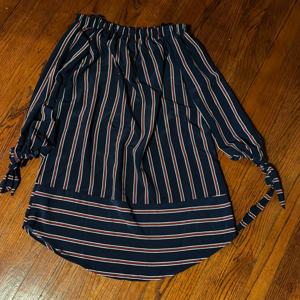 Off the shoulder navy, red, white dress. Tie at end of sleeves.